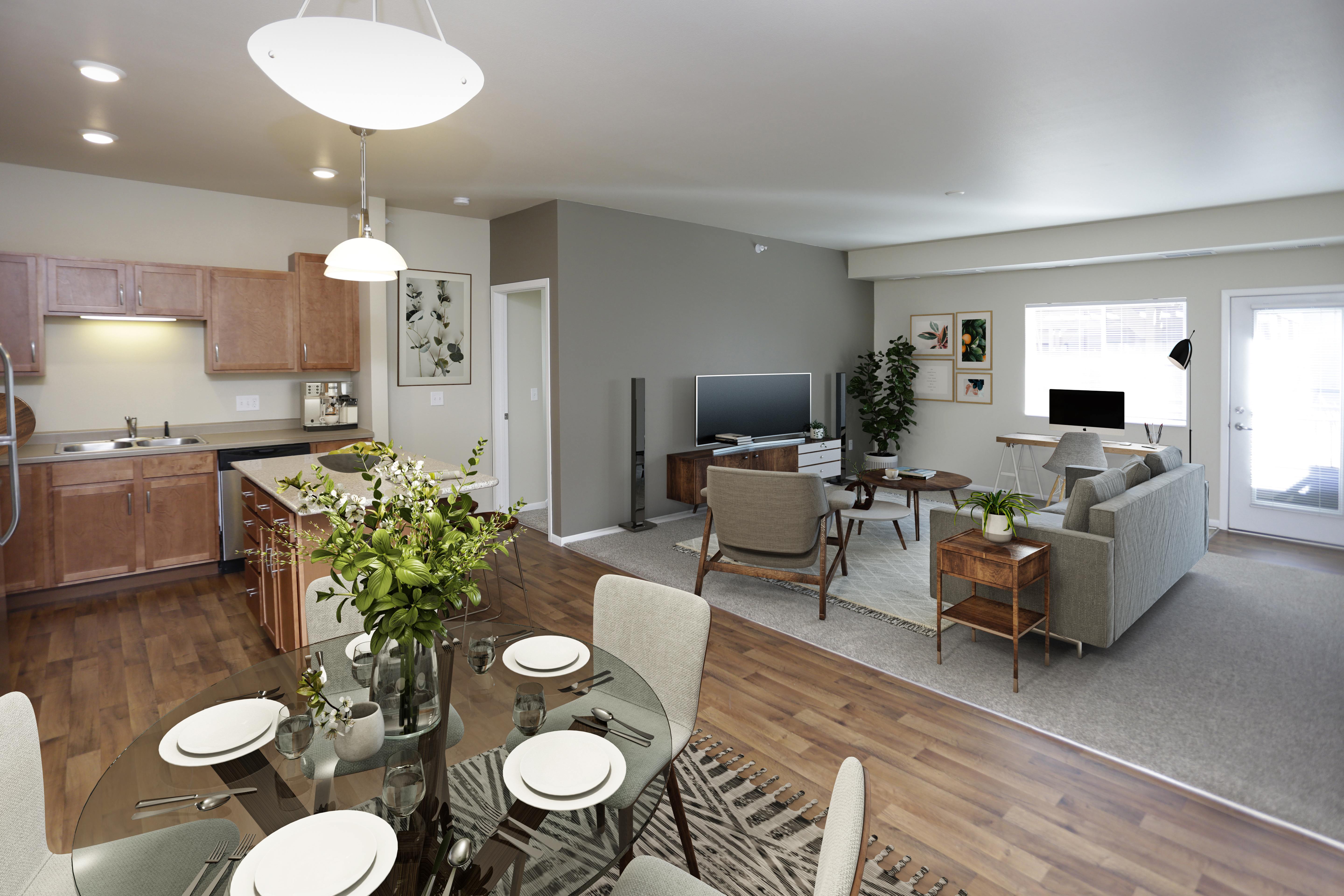 A modern kitchen with a dining table set for four.